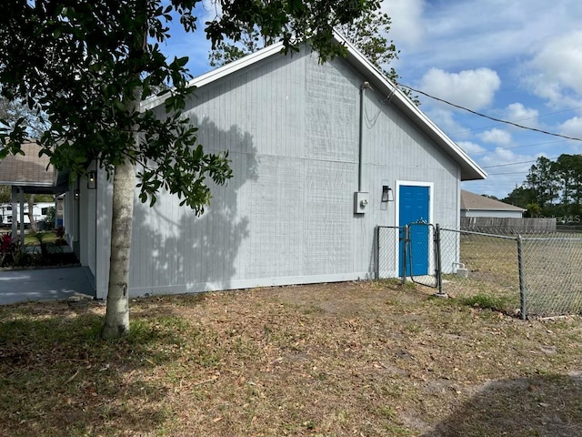 view of property exterior with fence