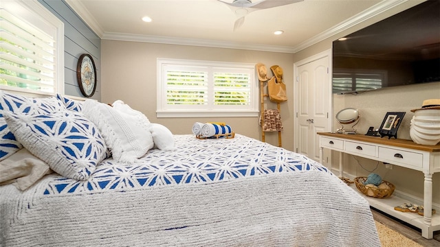 bedroom with recessed lighting, ornamental molding, and wood finished floors