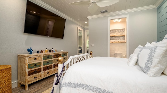 bedroom with visible vents, crown molding, wood finished floors, wooden ceiling, and a ceiling fan