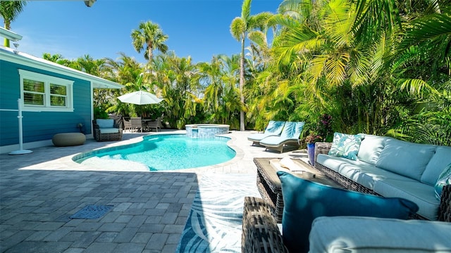 view of swimming pool featuring a pool with connected hot tub, outdoor lounge area, outdoor dining space, and a patio area