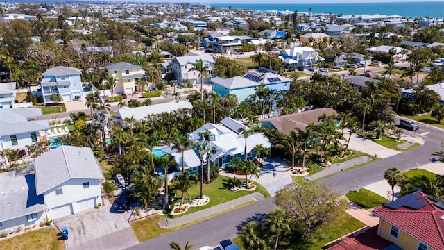 aerial view featuring a water view and a residential view