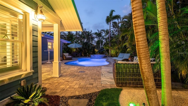 outdoor pool featuring a patio