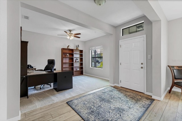 7418 61st St E, Palmetto, FL 34221 - office space featuring a ceiling fan, baseboards, visible vents, and wood finished floors