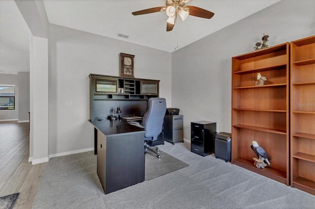 7418 61st St E, Palmetto, FL 34221 - office space featuring baseboards, a ceiling fan, light wood-style flooring, and visible vents