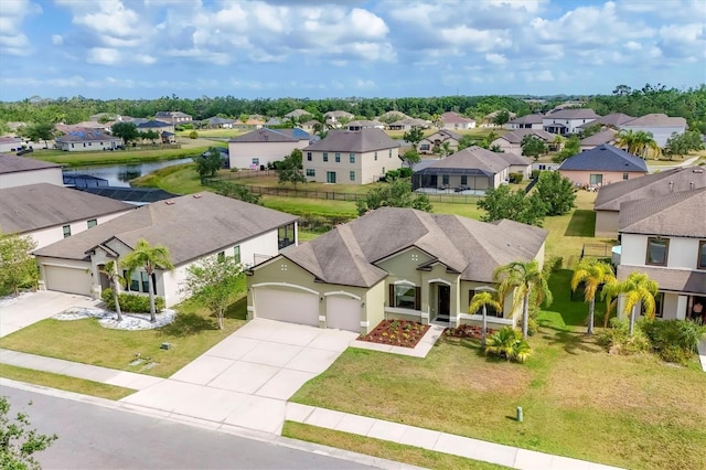 7418 61st St E, Palmetto, FL 34221 - drone / aerial view with a water view and a residential view