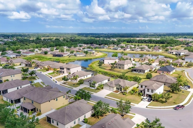 7418 61st St E, Palmetto, FL 34221 - drone / aerial view with a water view and a residential view