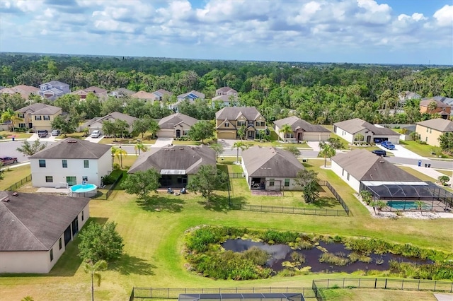 7418 61st St E, Palmetto, FL 34221 - birds eye view of property featuring a water view and a residential view