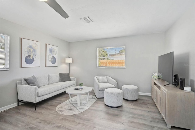 1112 65th St NW, Bradenton, FL 34209 - living room with a healthy amount of sunlight, light wood-type flooring, and visible vents