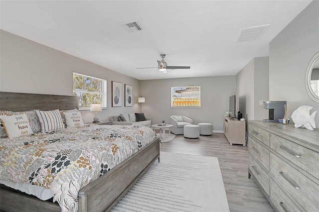 1112 65th St NW, Bradenton, FL 34209 - bedroom featuring visible vents, light wood-style flooring, ceiling fan, and baseboards
