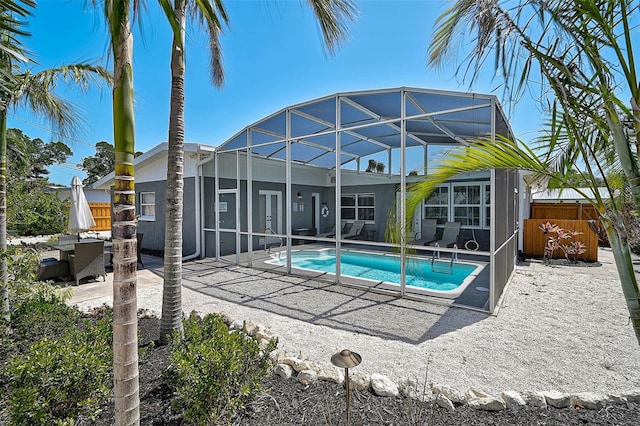 1112 65th St NW, Bradenton, FL 34209 - view of swimming pool with a patio, fence, a lanai, and a fenced in pool