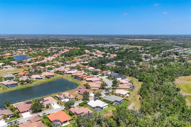 aerial view with a water view and a residential view