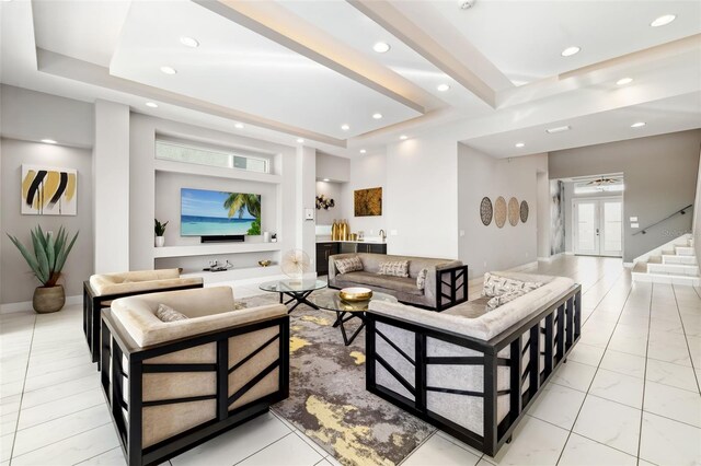 1514 Corolla Ct, Reunion, FL 34747 - living area featuring recessed lighting, a tray ceiling, baseboards, and light marble finish flooring