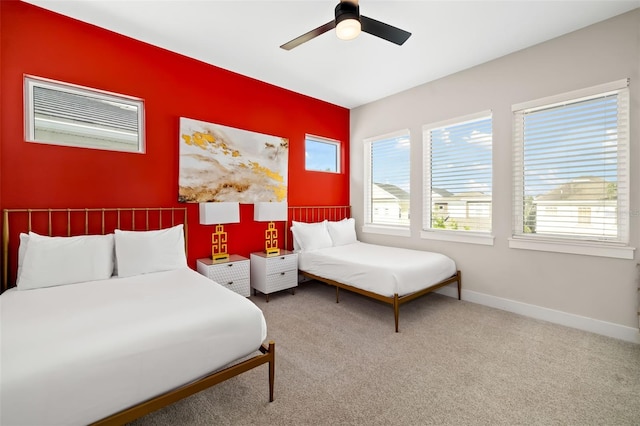 1514 Corolla Ct, Reunion, FL 34747 - carpeted bedroom with ceiling fan and baseboards