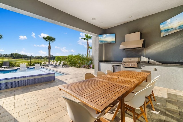 1514 Corolla Ct, Reunion, FL 34747 - view of patio featuring grilling area, exterior kitchen, fence, and outdoor dining area