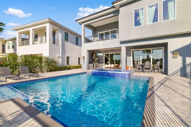 1514 Corolla Ct, Reunion, FL 34747 - view of swimming pool featuring a pool with connected hot tub, a patio area, and outdoor dining space