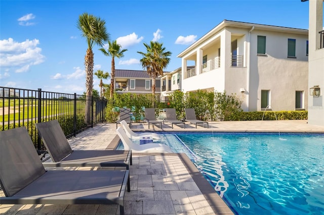 1514 Corolla Ct, Reunion, FL 34747 - view of pool featuring fence and a patio