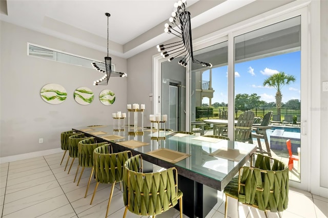 1514 Corolla Ct, Reunion, FL 34747 - dining area with a chandelier and baseboards
