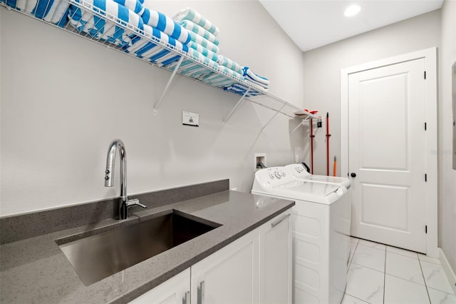 1514 Corolla Ct, Reunion, FL 34747 - laundry room with separate washer and dryer, cabinet space, light marble finish floors, and recessed lighting
