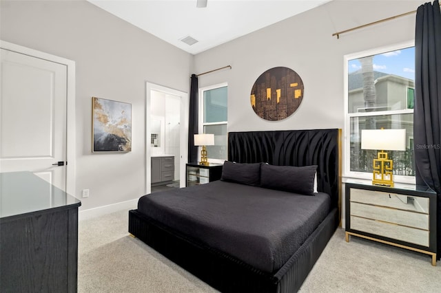 1514 Corolla Ct, Reunion, FL 34747 - bedroom featuring carpet floors, baseboards, and ensuite bathroom