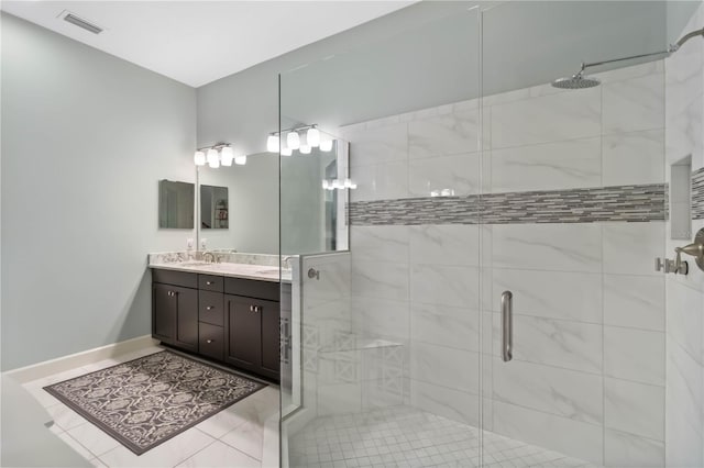 5978 Anise Dr, Sarasota, FL 34238 - bathroom featuring vanity, baseboards, a shower stall, and visible vents