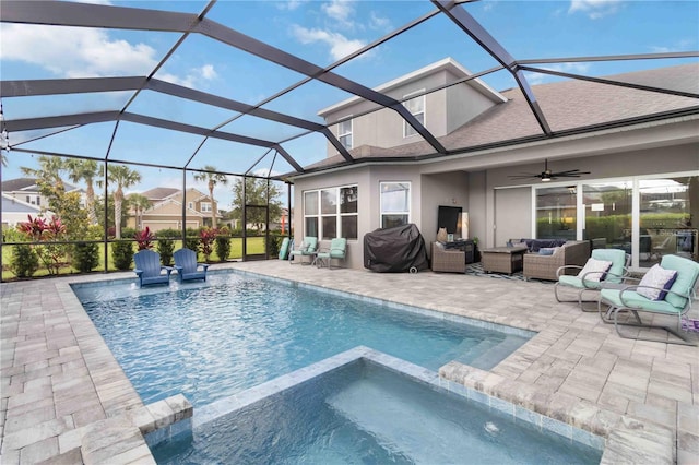 5978 Anise Dr, Sarasota, FL 34238 - view of pool featuring a ceiling fan, a pool with connected hot tub, glass enclosure, a patio, and outdoor lounge area
