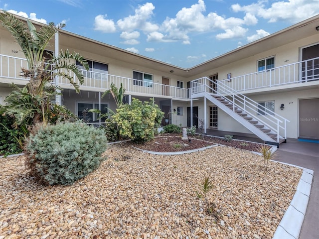340 Base Ave E Unit 314, Venice, FL 34285 - view of property's community with stairway