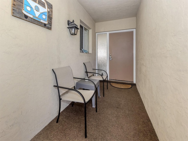 340 Base Ave E Unit 314, Venice, FL 34285 - view of exterior entry with stucco siding