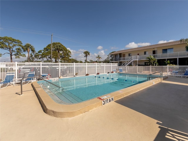 340 Base Ave E Unit 314, Venice, FL 34285 - pool featuring fence and a patio