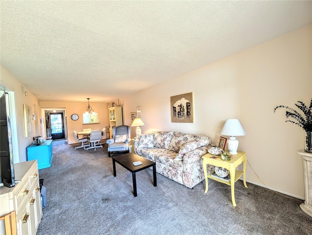 3559 Lake Bayshore Dr Unit J-204, Bradenton, FL 34205 - carpeted living room with a textured ceiling