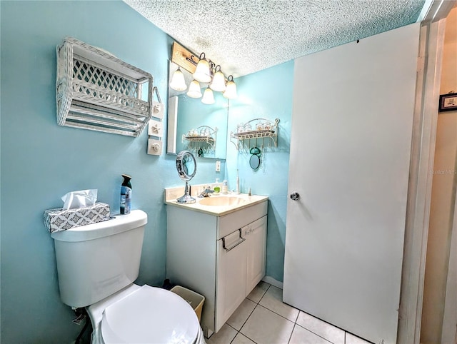 3559 Lake Bayshore Dr Unit J-204, Bradenton, FL 34205 - bathroom with vanity, tile patterned flooring, toilet, and a textured ceiling
