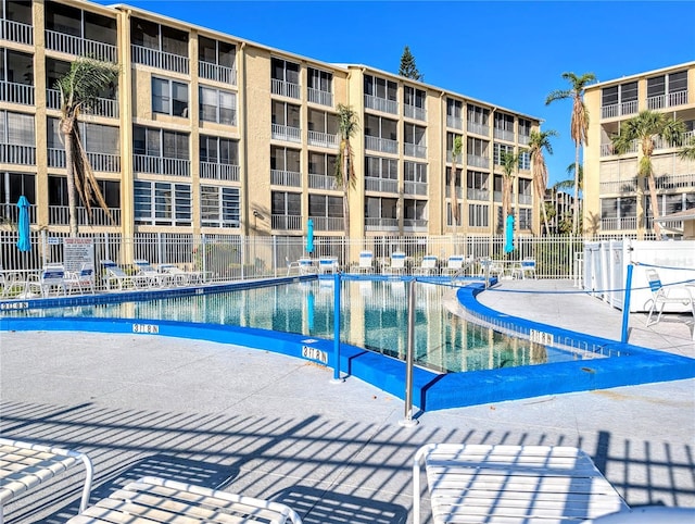 3559 Lake Bayshore Dr Unit J-204, Bradenton, FL 34205 - pool featuring fence and a patio