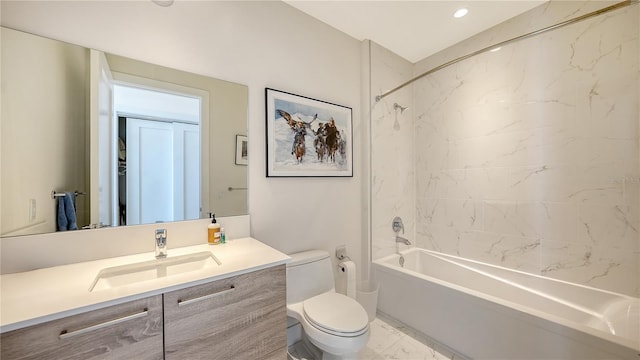 bathroom featuring toilet, vanity, marble finish floors, and shower / bathtub combination