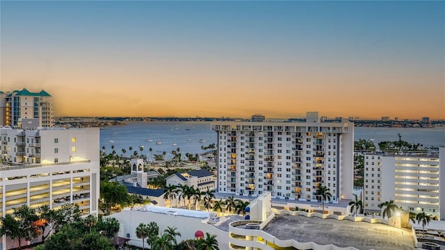 view of urban area featuring a nearby body of water
