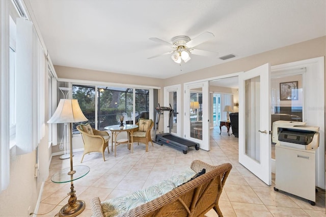 sunroom featuring french doors