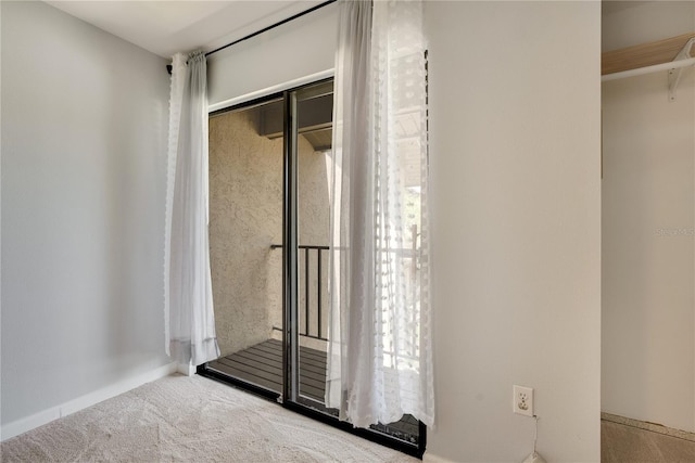 details with baseboards and carpet