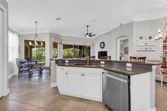 kitchen featuring a sink, dishwasher, ceiling fan with notable chandelier, visible vents, and ornamental molding