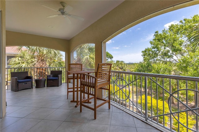 balcony featuring ceiling fan