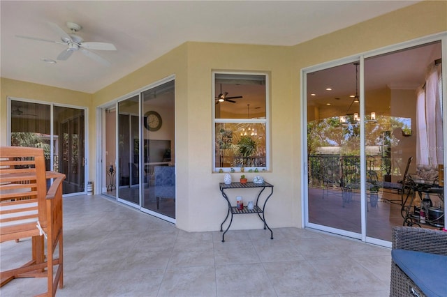 view of patio featuring ceiling fan
