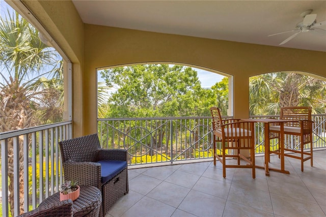 balcony featuring ceiling fan
