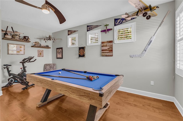 recreation room featuring baseboards, ceiling fan, billiards, and wood finished floors