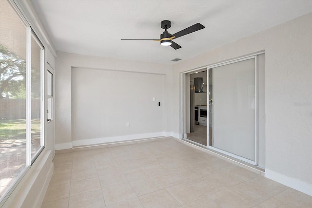 unfurnished sunroom with visible vents