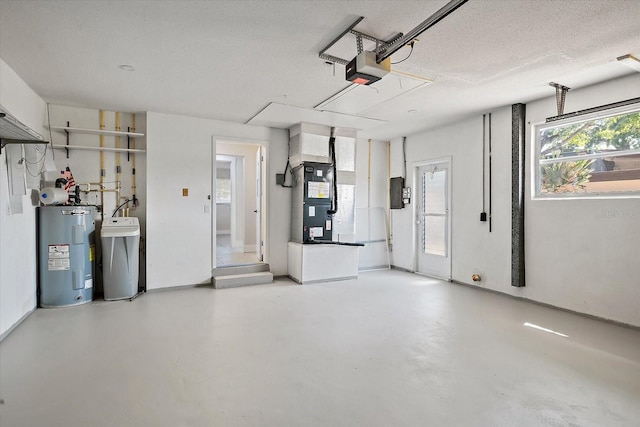garage with a garage door opener, heating unit, and water heater