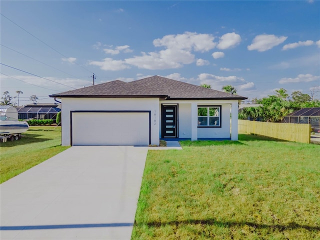 18182 Steele Ave, Port Charlotte, FL 33948 - view of front facade featuring fence, a front lawn, a garage, stucco siding, and concrete driveway