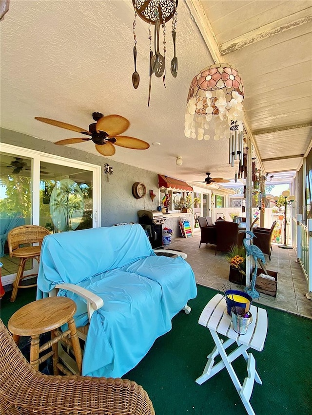 sunroom / solarium featuring plenty of natural light