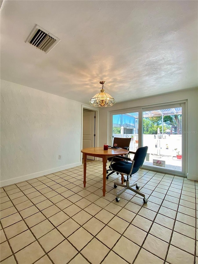 dining space featuring light tile patterned floors, baseboards, visible vents, and a healthy amount of sunlight