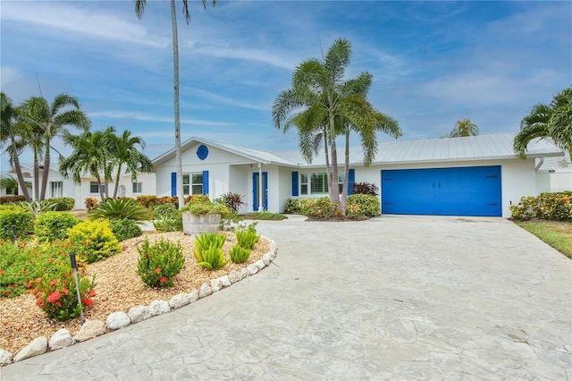 10108 Kingfisher Rd E, Bradenton, FL 34209 - single story home with stucco siding, driveway, and a garage