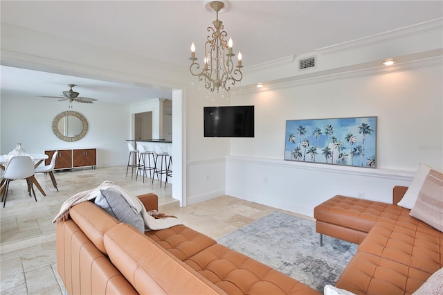 10108 Kingfisher Rd E, Bradenton, FL 34209 - living area featuring a chandelier, ornamental molding, and ceiling fan