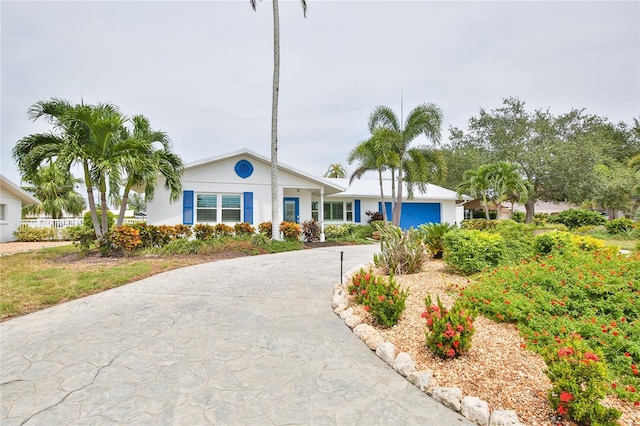 10108 Kingfisher Rd E, Bradenton, FL 34209 - ranch-style house with driveway and stucco siding