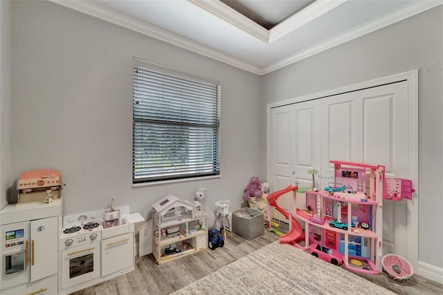 8123 Wawana Rd, North Port, FL 34287 - playroom with crown molding and wood finished floors