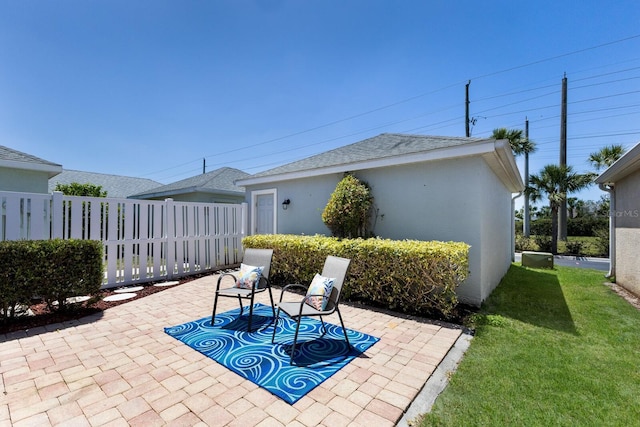 view of patio / terrace with fence